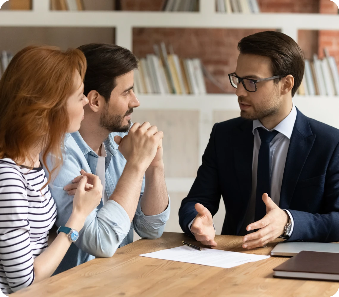 Couple meeting with business professional